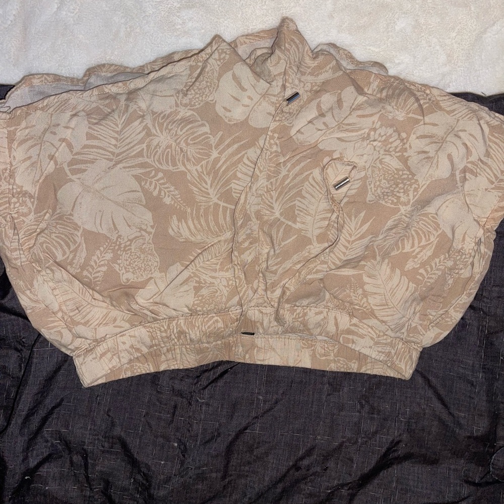 Tan and white leaf print shorts